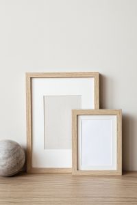 Kaboompics - Books, Dried Feathers and Marble Disc Styled for Neutral Home Decor