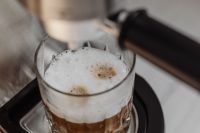 Kaboompics - Top View of Foamy Layered Coffee in Faceted Glass