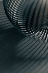 Kaboompics - Close-Up Silver Coil Curve with Dark Shadow