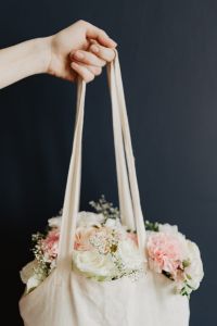 Kaboompics - Bouquet of flowers in a bag with some fairy lights