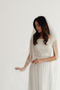 Kaboompics - Sheer Wedding Veil Draped Over an Embellished Bridal Bodice