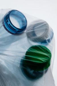 Kaboompics - Plastic Bottles Wrapped In Transparent Bag Minimal Concept