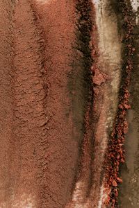 Kaboompics - Layered Brown Red and Dark Makeup Powders