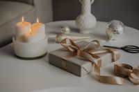 Kaboompics - Holiday Gift-Wrapping Workspace with Ribbon, Scissors, Candles and Silver Bauble