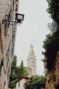 Kaboompics - St. Euphemia Church Tower Framed by a Narrow Rovinj Alley