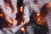 Kaboompics - Burgundy Geometric Fabric Texture with Warm Christmas Bokeh
