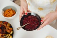 Kaboompics - Holding Cranberry Sauce beside a Roast Turkey Dinner