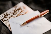 Kaboompics - Minimal Holiday Stationery with Envelope and Pen