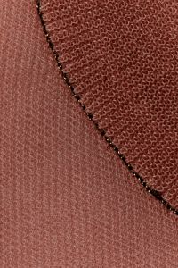 Kaboompics - Terracotta sheer knit fabric with gold chain stitching close-up