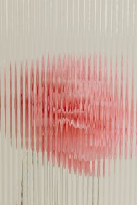 Kaboompics - Abstract Pink Flower Distorted Through Ribbed Glass, Minimal Floral Texture
