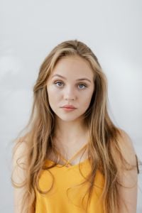 Kaboompics - Centered Blonde Teen Girl Portrait with Direct Gaze