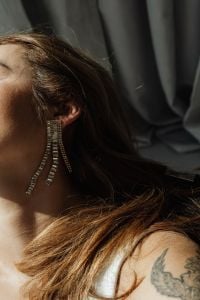 Kaboompics - Close-Up of a Crystal Drop Earring and Wavy Hair