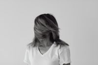 Kaboompics - Woman with Windblown Hair Covering Her Face