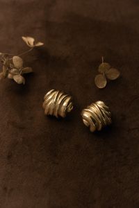 Kaboompics - Gold Earrings With Dried Flowers