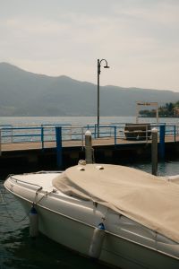 Kaboompics - Covered Motorboat Moored Along the Lake Iseo Waterfront
