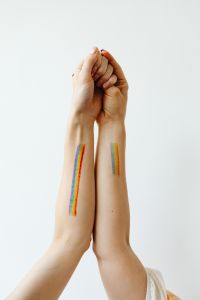Kaboompics - Clasped Hands with Rainbow Pride Body Paint