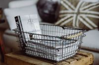 Kaboompics - Magazines in a metal basket