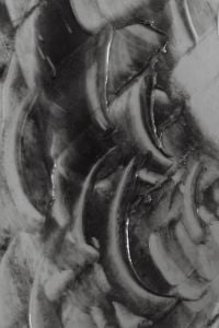 Kaboompics - Monochrome Skincare Cream Swirls with Glossy Curved Ridges