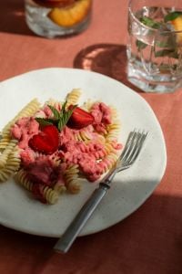 Strawberry Pasta and Peach Drinks on a Summer Table