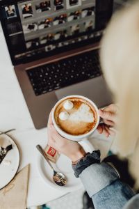 Kaboompics - Working with a laptop & coffee on white marble