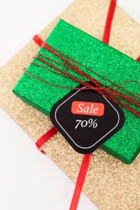 Kaboompics - 70 Percent Sale Label on Green Gift Wrap Close-Up