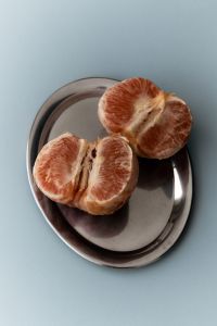 Kaboompics - Grapefruit Slices on Metal Tray