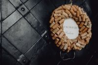 Kaboompics - Close-Up Circle of Wine Corks on Dark Tiled Surface