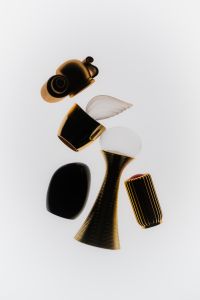 Kaboompics - Graphic Perfume Bottle Composition On White