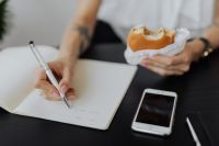 Kaboompics - Office Work Notes Beside Sandwich and Smartphone