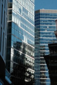 Kaboompics - Glass Office Tower Reflected in Steel Structure