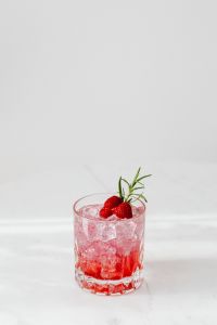 Kaboompics - Raspberry Soda With Rosemary In Sunlight