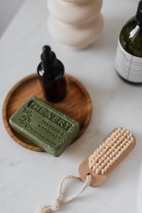 Kaboompics - Olive Soap with Amber Dropper and Pump Bottle, Eco-Friendly Bathroom Skincare Still Life
