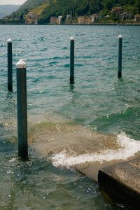 Kaboompics - Waves Reaching a Lakeside Dock on Lake Iseo