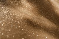 Kaboompics - Gold Glitter Wave With Diagonal Sparkle and Shallow Focus