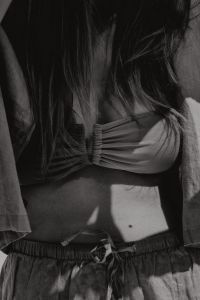 Kaboompics - Black and White Swimwear Close-Up with Ruched Bikini Top
