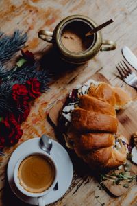 Kaboompics - Croissant with goat cheese, beetroot and a cup of coffee for breakfast