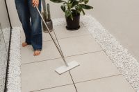Kaboompics - Close-Up of Dustpan and Brush on a Tiled Floor