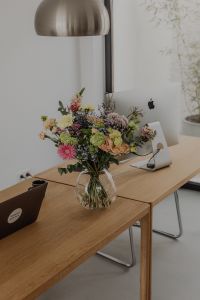 Kaboompics - Pendant Light, Desktop Computer and Floral Home Office Styling