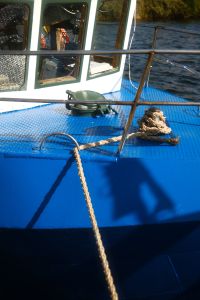 Kaboompics - Blue Fishing Boat Deck with Rope and Metal Cleat