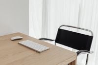 Kaboompics - Minimal Oak Office Desk with White Keyboard, Mouse and Black Chair