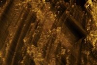 Kaboompics - Diagonal Dark Shadows across Gold Grain, Abstract Background for Luxury Design