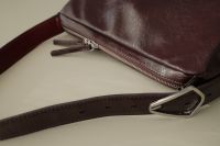 Kaboompics - Cherry Burgundy Bag and Leather Strap Close-Up