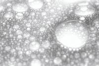 Kaboompics - Two Sparse Cosmetic Foam Clusters on White, Minimal Vertical Background
