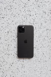 Kaboompics - Back of Black Apple iPhone 11 Pro on White Terrazzo