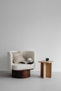 Minimalist Living Room with Oak Side Table and Bouclé Chair