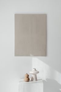 Kaboompics - Beige Canvas and White Vase Detail on a Minimal Wall