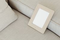 Kaboompics - Small Speckled Frame Mockup on Sofa with Copy Space