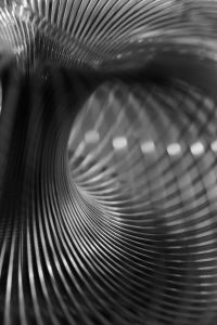 Kaboompics - Abstract Silver Coil Tunnel with Dark Center