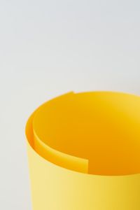 Kaboompics - Close-Up of a Curled Yellow Paper Roll