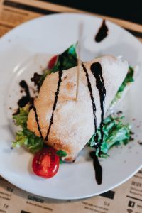 Tasty vegetable sandwich with drinks